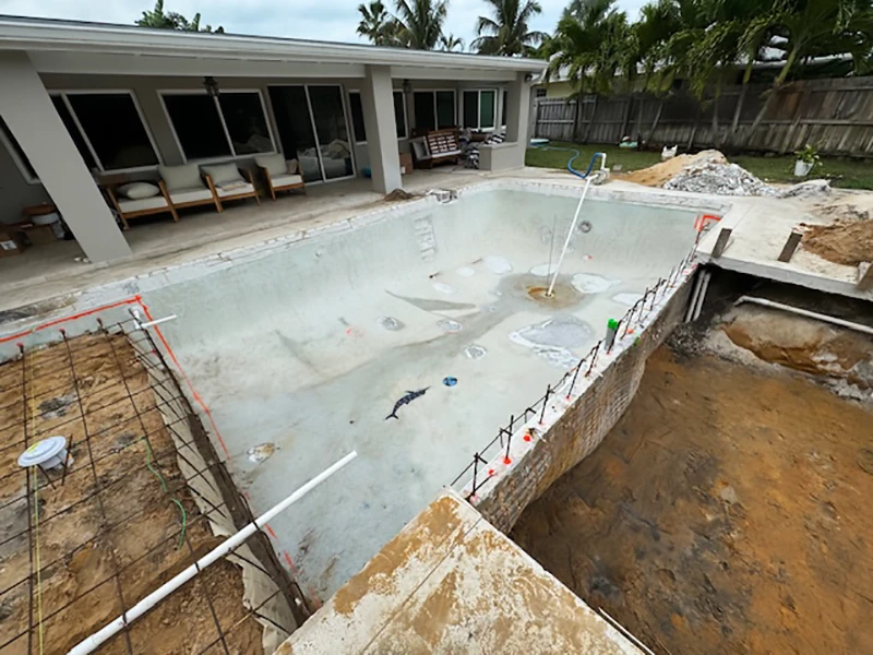 Empty swimming pool under construction