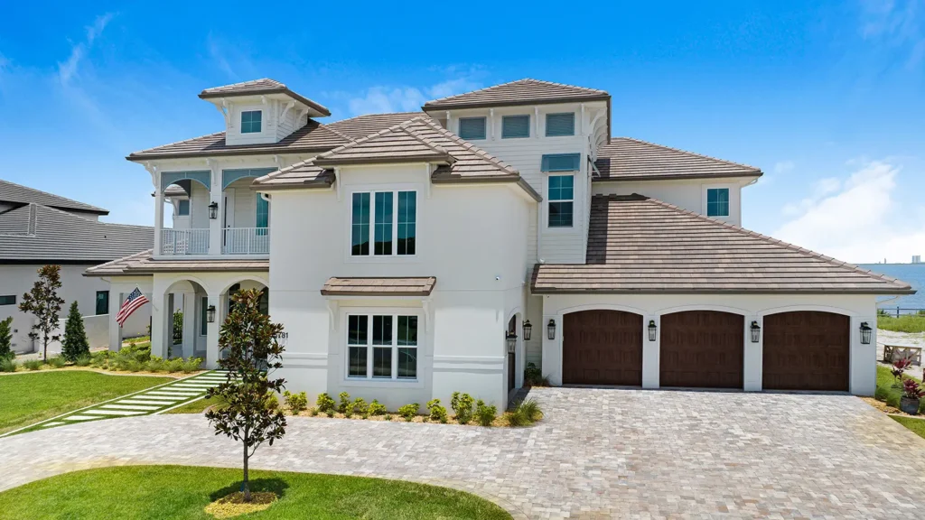 A modern home with custom driveway stone pavers
