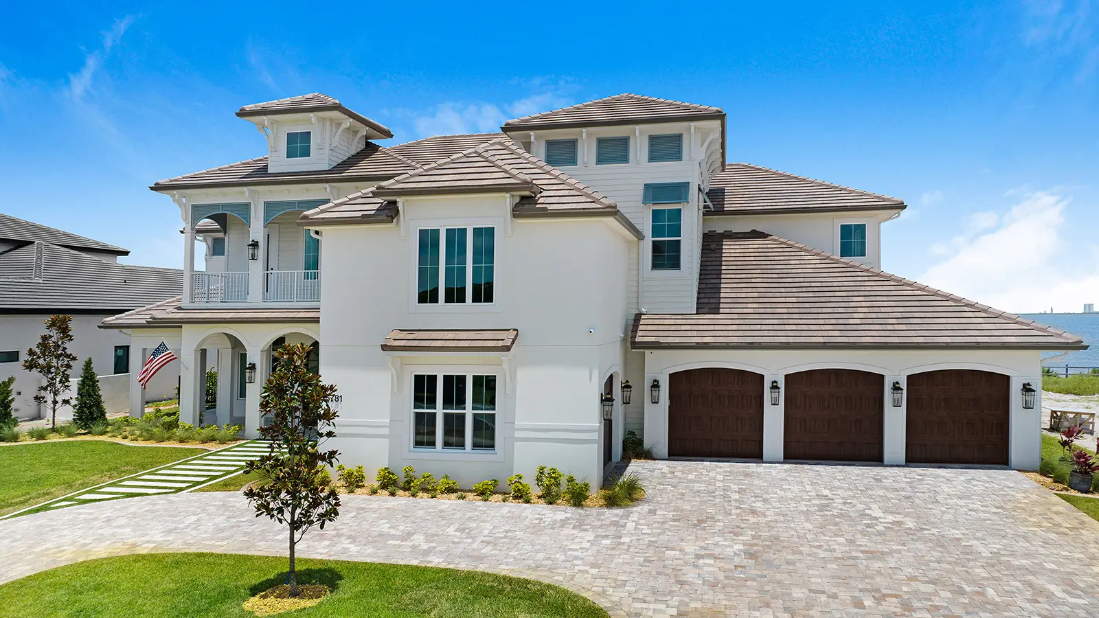A modern home with custom driveway stone pavers