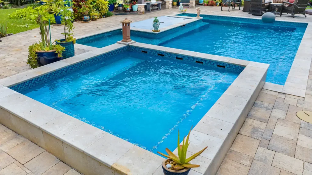A swimming pool with a built in spa